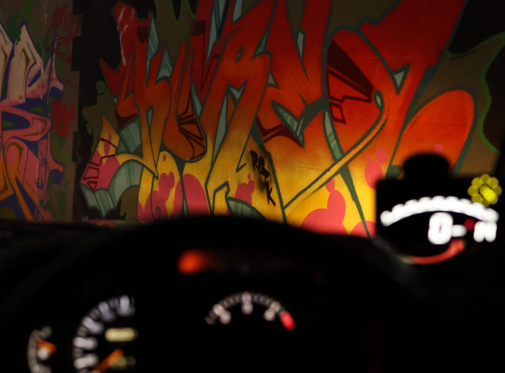 graffiti at night in a car